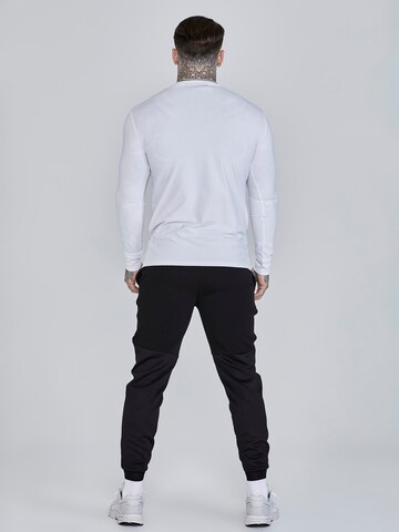 Maglietta di SikSilk in bianco