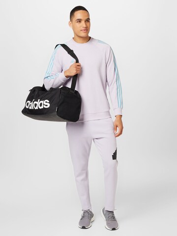 ADIDAS SPORTSWEAR Tapered Sportbroek 'Future Icons Badge Of Sport' in Lila