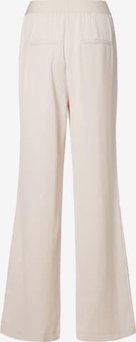Marie Lund Flared Pleat-Front Pants in Beige