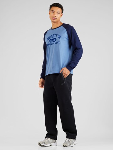 Largi Pantaloni 'TECH FLEECE' de la Nike Sportswear pe negru