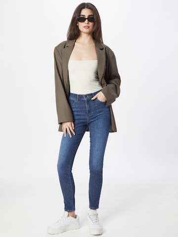 WRANGLER Skinny Džíny – modrá