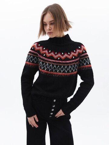 Pull-over OXXO en noir : devant