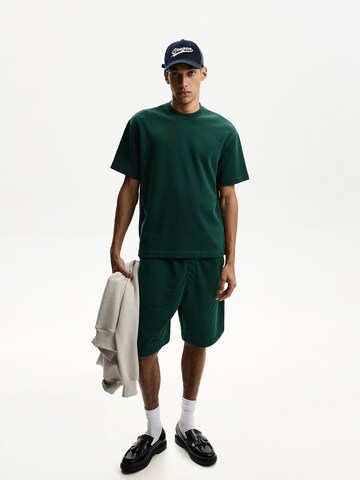 Bershka Loosefit Byxa i grön