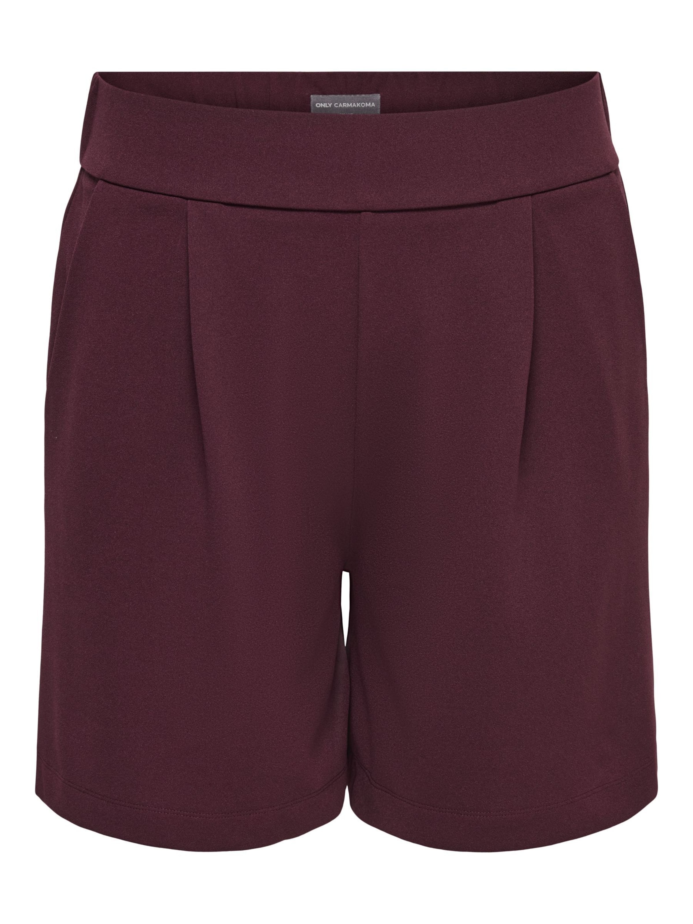 Pantaloni con pieghe di ONLY Carmakoma in rosso: frontale