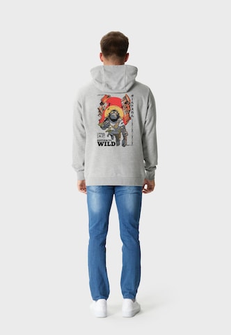 Oldskull Sweatshirt 'Wrldvibe Return to Wild Graphic' in Grijs