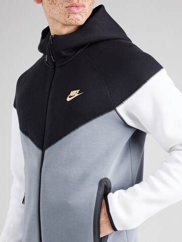 Nike Sportswear Bluza rozpinana 'TCH FLEECE' w kolorze czarny