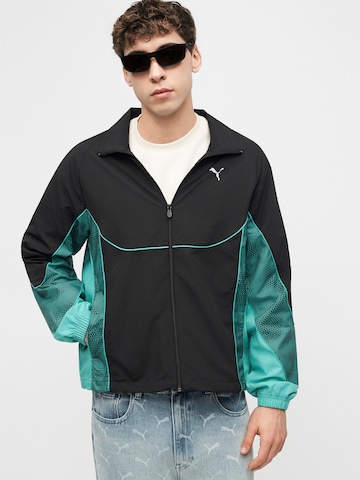 PUMA Övergångsjacka 'PUMATECH-X' i svart: framsida