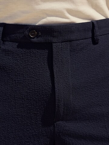 Coupe slim Pantalon à plis Next en bleu