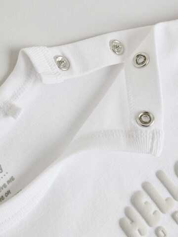 Set Next en blanc