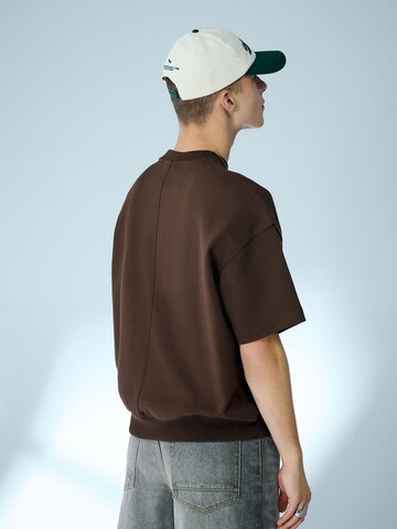 Bershka Bluzka sportowa w kolorze brązowy