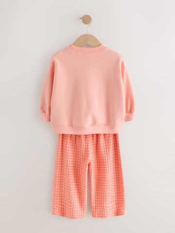 Next - Conjuntos em laranja