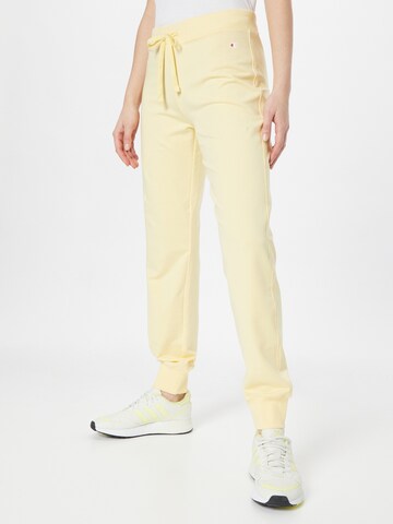 Effilé Pantalon Champion Authentic Athletic Apparel en jaune : devant