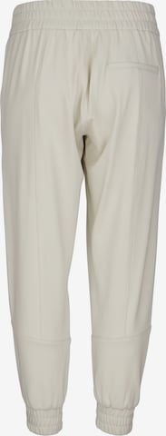 ÆNGELS Tapered Workout Pants in Beige