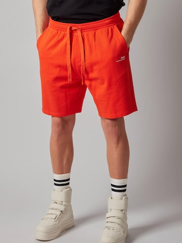 OWN Off With Nature Hose in Orange: Vorderseite