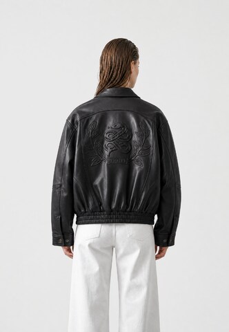 Veste mi-saison Vertere Berlin en noir : derrière