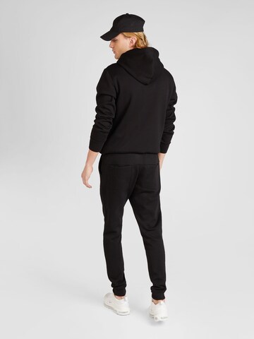 BJÖRN BORG - Tapered Pantalón deportivo 'ESSENTIAL' en negro