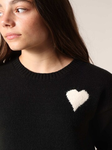 Robes en maille 'Kissy' Deeluxe en noir