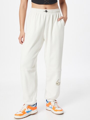 Nike Sportswear Tapered Pants in White: front
