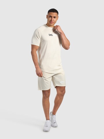 Loosefit Pantalon de sport ' Powerfit Pro ' Smilodox en blanc