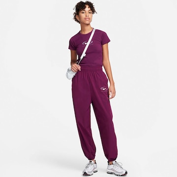 Nike Sportswear Tapered Pants in Purple