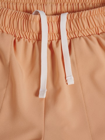 Hummel Loosefit Sportshorts 'Pulse' in Orange