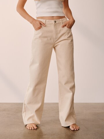 ABOUT YOU x Marie von Behrens Loose fit Trousers 'Eva' in Beige: front
