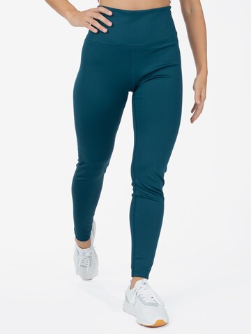 Spyder Skinny Workout Pants in Green: front