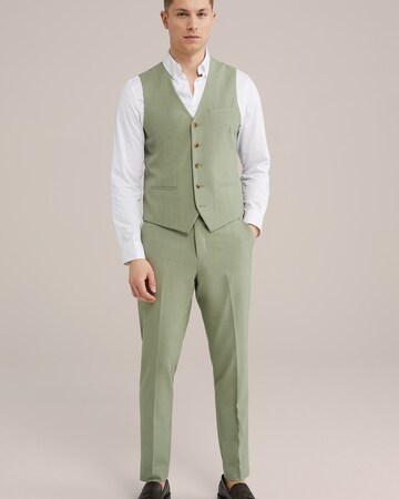 Tapered Pantaloni con piega frontale di WE Fashion in verde