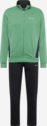 Champion Authentic Athletic Apparel Tracksuit in Green: front