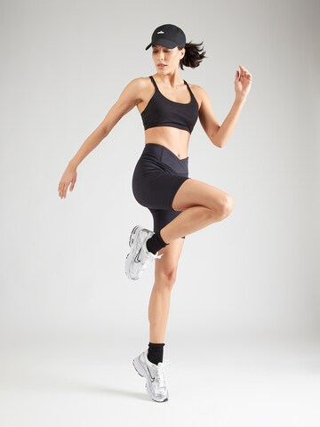 Reebok Skinny Sports trousers in Black