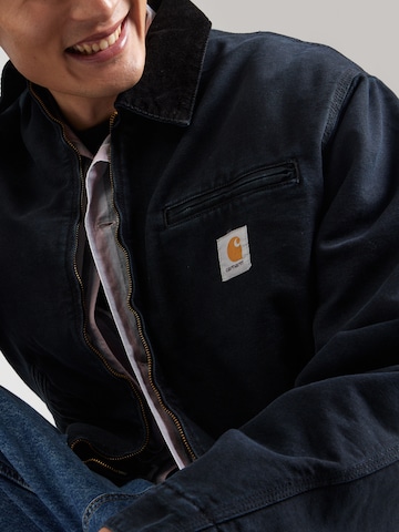Carhartt WIP Välikausitakki 'Detroit' värissä musta
