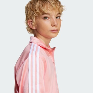 Veste de survêtement 'Adicolor Firebird' ADIDAS ORIGINALS en rose
