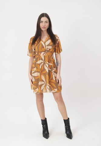 Elara Kjole i beige: forside