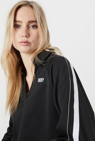 Pullover sportivo di DKNY Performance in nero: frontale