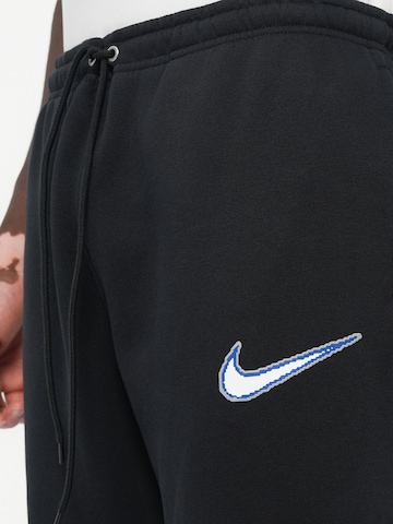 juoda Nike Sportswear Siaurėjantis Kelnės 'CLUB'
