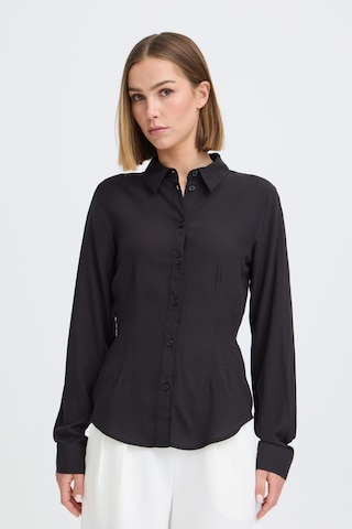Oxmo - Blusa ' OXNIlla ' en negro: frente