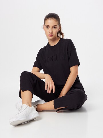 PUMA Performance shirt 'PUMA x Vogue Collection' in Black