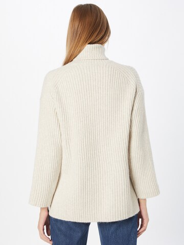 ABOUT YOU Sweter 'Caya' w kolorze beżowy