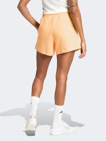 ADIDAS SPORTSWEAR Voľný strih Športové nohavice 'ALL SZN' - Oranžová