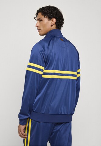 Giacca per l'allenamento 'Dmwu' di Unfair Athletics in blu