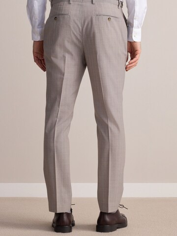 Slimfit Pantaloni con piega frontale di Next in beige