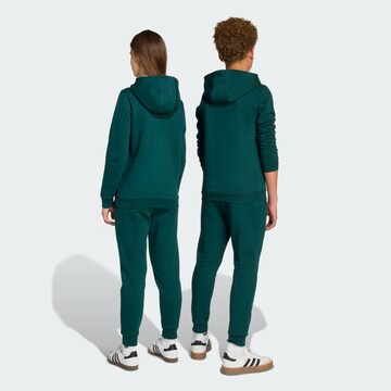 ADIDAS ORIGINALS Конический (Tapered) Штаны 'Trefoil Essentials' в Зеленый