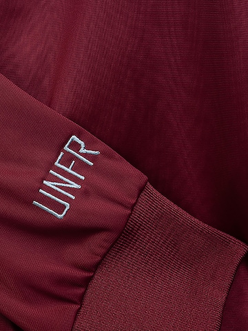Unfair Athletics Training jacket 'Tracktop' in Red