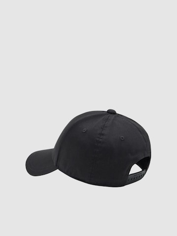 Chapeaux 'XM001694' ARMANI EXCHANGE en noir