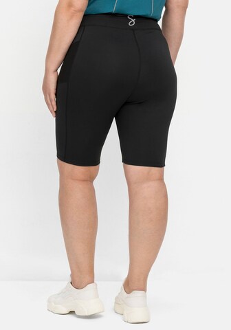 SHEEGO Skinny Pants in Black