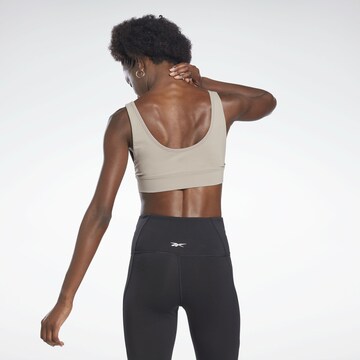 Reebok Бюстие Спортен сутиен в сиво