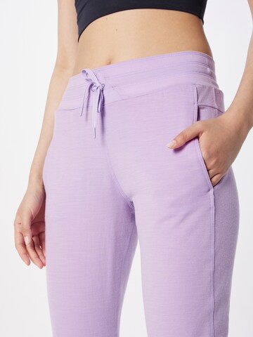 Effilé Pantalon de sport 'Crush' ICEBREAKER en violet