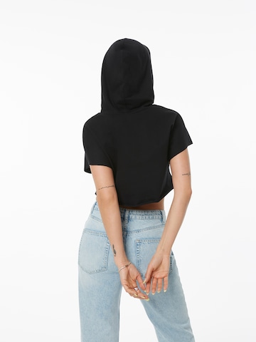 Sweat-shirt 'IDA' ABOUT YOU x Alina Eremia en noir