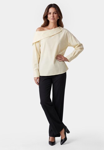 Usha - Blusa en amarillo