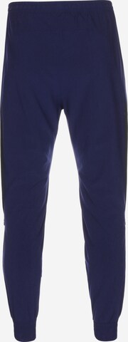 NIKE Tapered Workout Pants 'F.C. Joga Bonito 2.0' in Blue